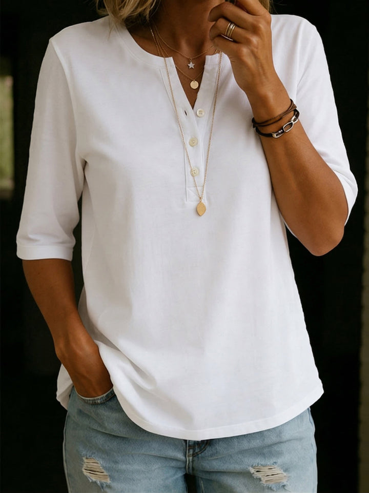 Versatile women's notch neck blouse with 3/4 sleeves, a comfortable and classic top for daily wear.