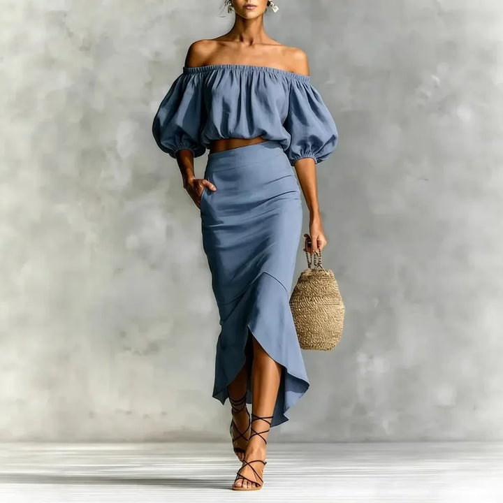Fashionable women's off-shoulder puff sleeve top paired with a chic wrap midi skirt, a stylish two-piece summer set.