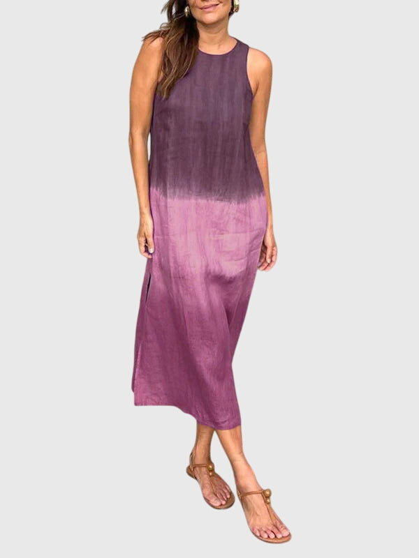 Vibrant women's summer dress with an artistic print. This stylish and versatile flowy dress is a wardrobe essential.