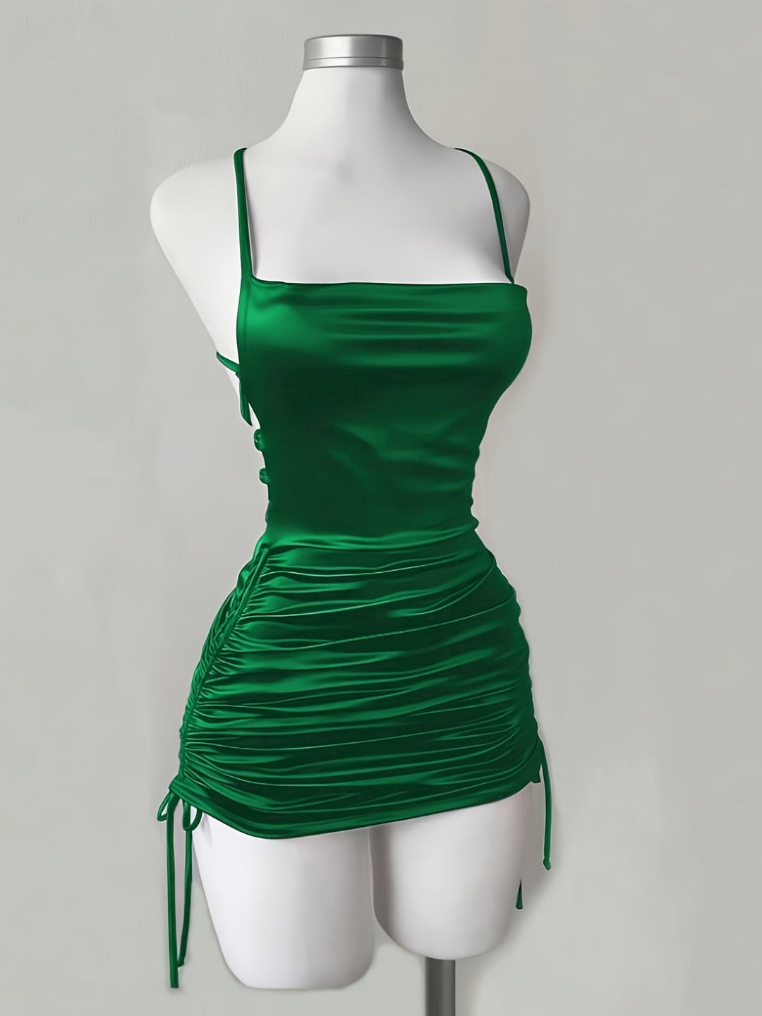 Flattering bodycon mini dress with adjustable ruched drawstring; a stylish choice for homecoming.