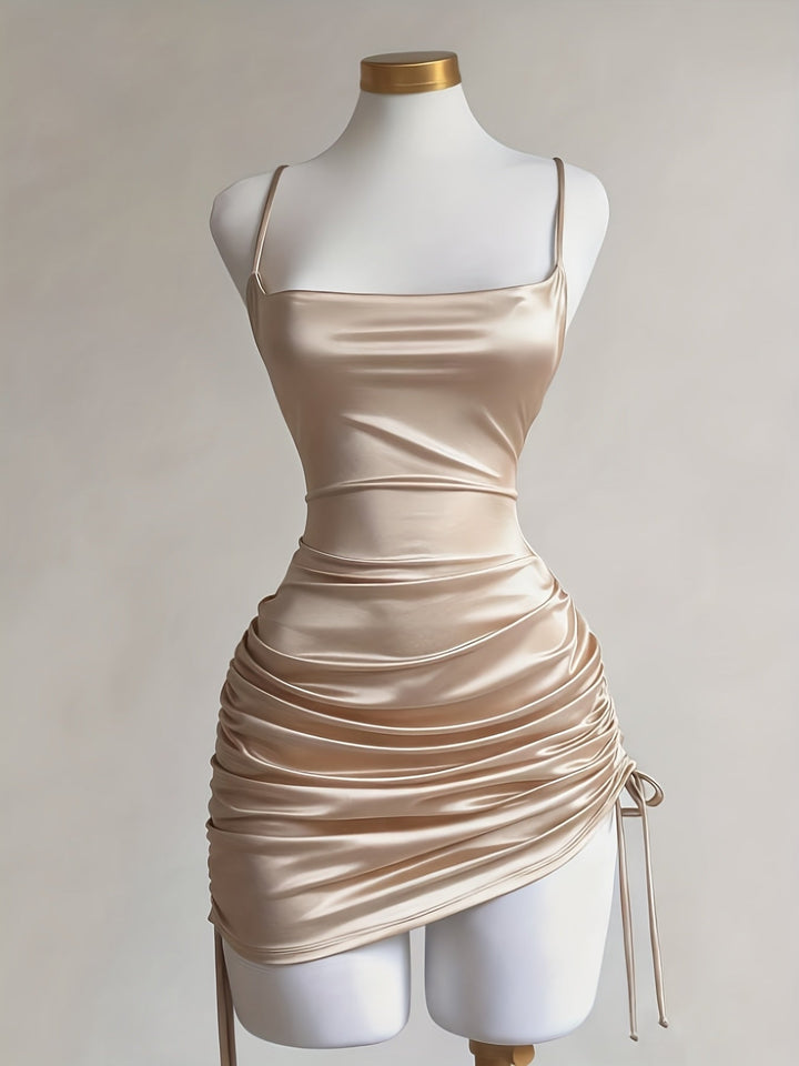 Elegant sleeveless square neck ruched mini dress, ideal as a homecoming or cocktail party outfit.