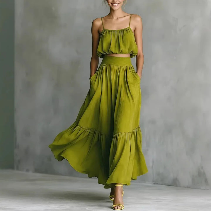 Chic women's ruffle hem crop top & flowy maxi skirt two-piece set for summer beach & vacation wear.