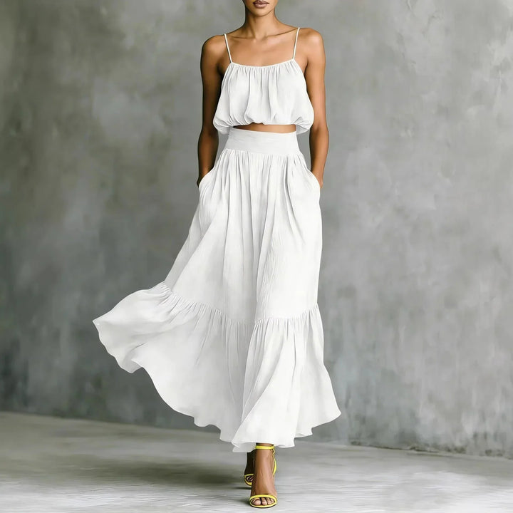 Elegant women's matching set: chic ruffle hem crop top & a comfortable, flowy maxi skirt for summer fashion.
