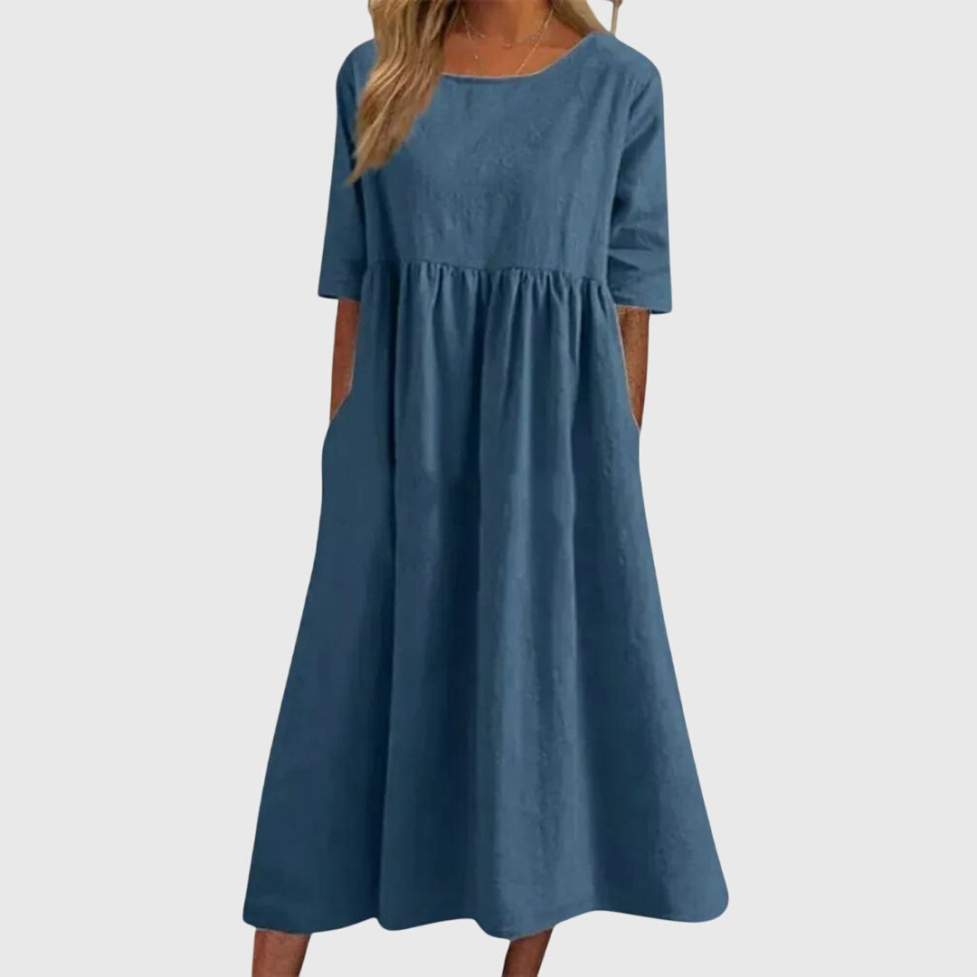 Casual women's short-sleeved summer dress. Comfortable everyday wear with a flattering, chic style.