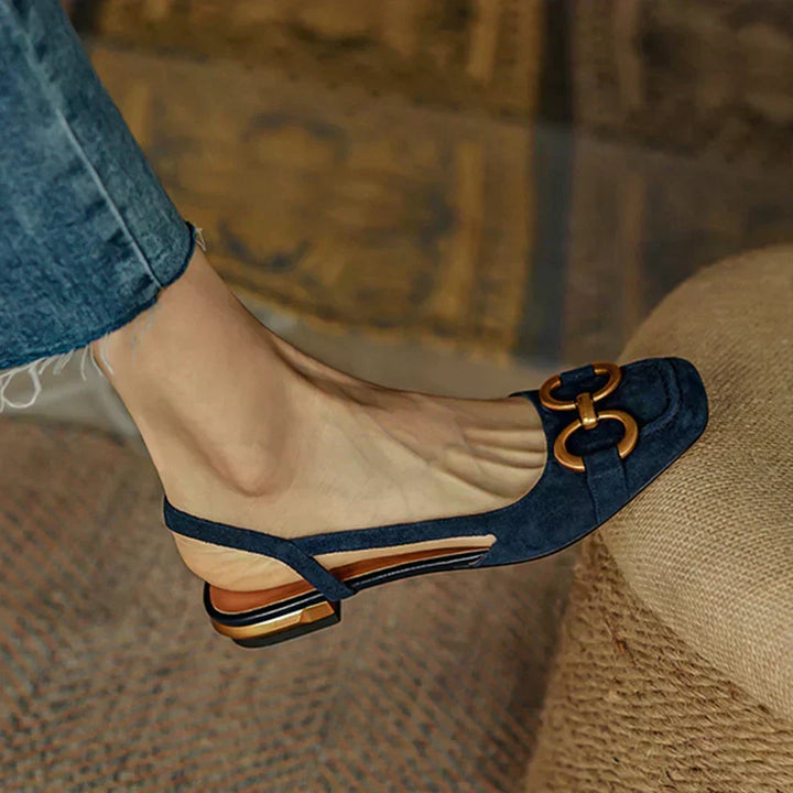 Stylish beige women's slingback flats with an ergonomic design, perfect for work or casual wear.