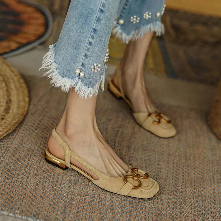 Everyday women's ergonomic slingback flats in black, providing ultimate comfort and chic, versatile style.