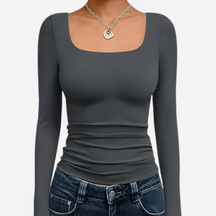 Women's casual wear crop top. Long sleeve, square neck, and solid color for a versatile modern look.