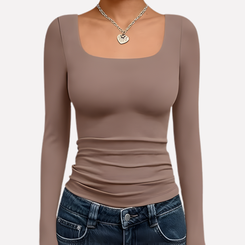 Trendy women's long sleeve crop top. Featuring a stylish square neck for chic spring & fall outfits.