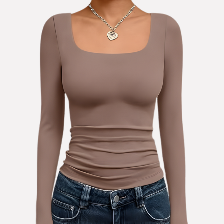 Trendy women's long sleeve crop top. Featuring a stylish square neck for chic spring & fall outfits.