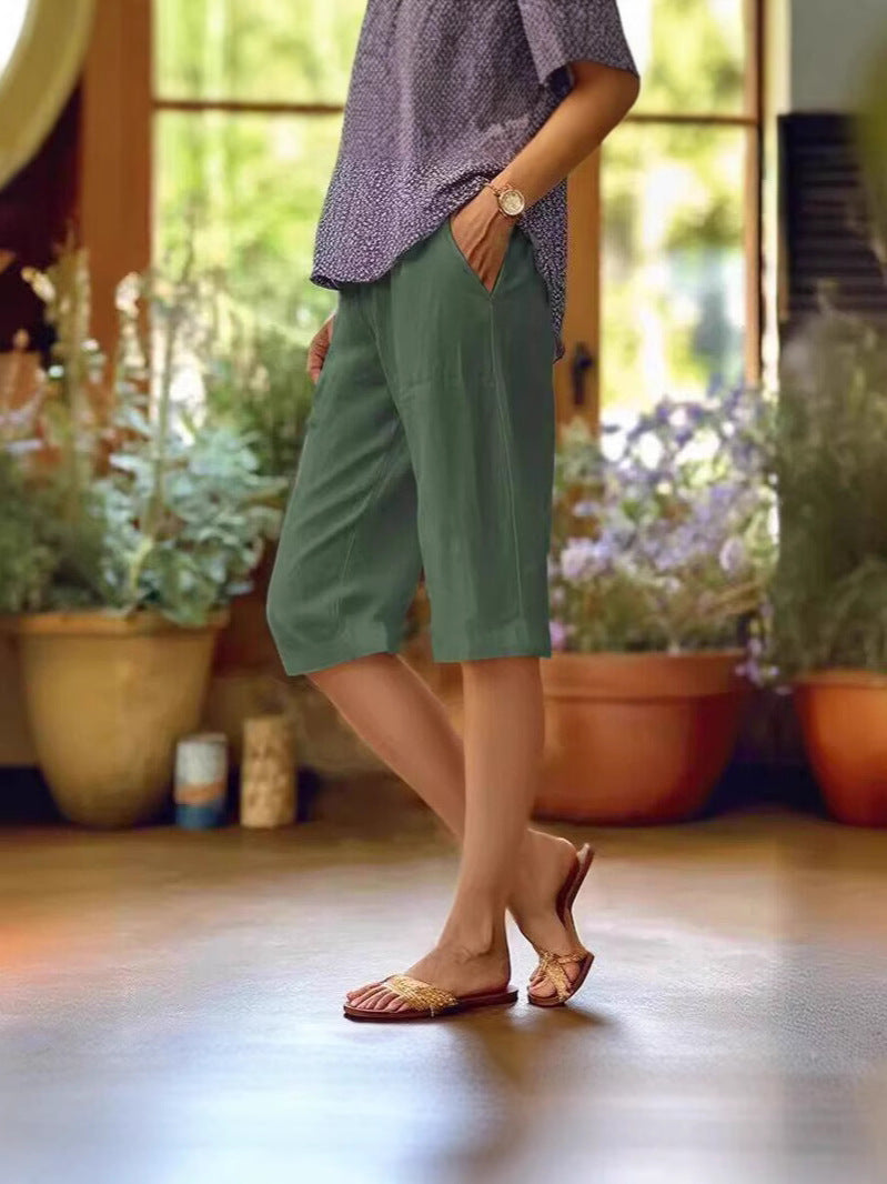 Stylish women's knee-length summer shorts with a straight leg design, essential for warm weather fashion.