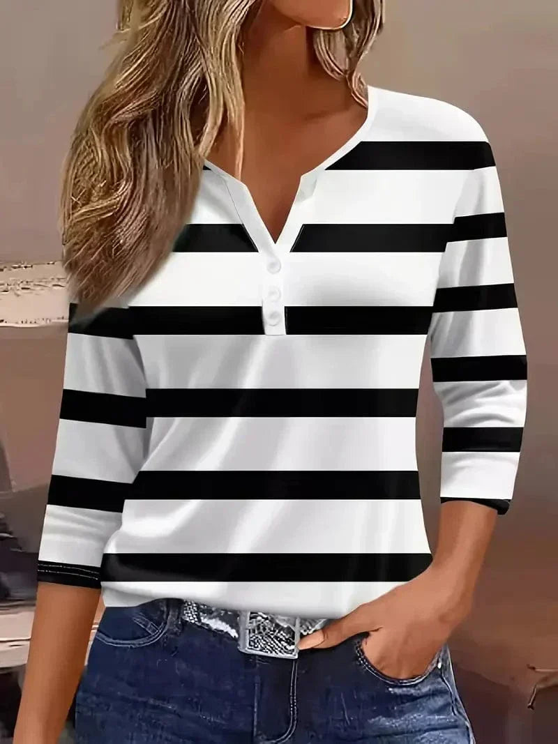 Effortless women's casual elegant striped V-neck blouse with three-quarter sleeves for spring and summer fashion.
