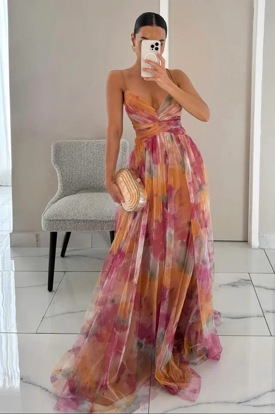 Chic women's textured layered maxi dress, sleeveless & flowy for elegant summer fashion. Perfect occasion wear.