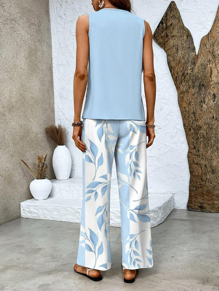 Trendy women's two-piece set featuring a stylish flowy top and flattering wide-leg pants, ideal for summer.