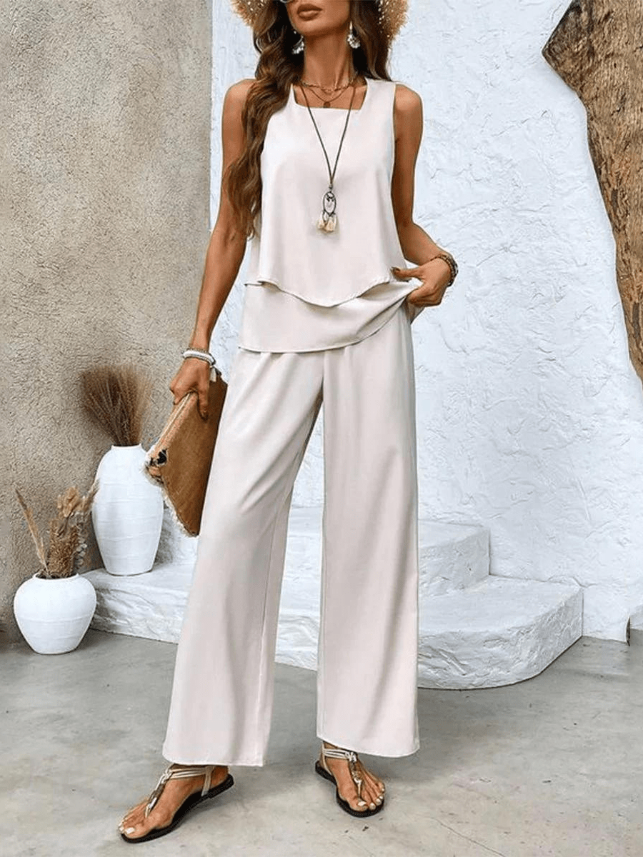 Women's summer set: a relaxed flowy top paired with fashionable wide-leg pants for a chic, comfy look.