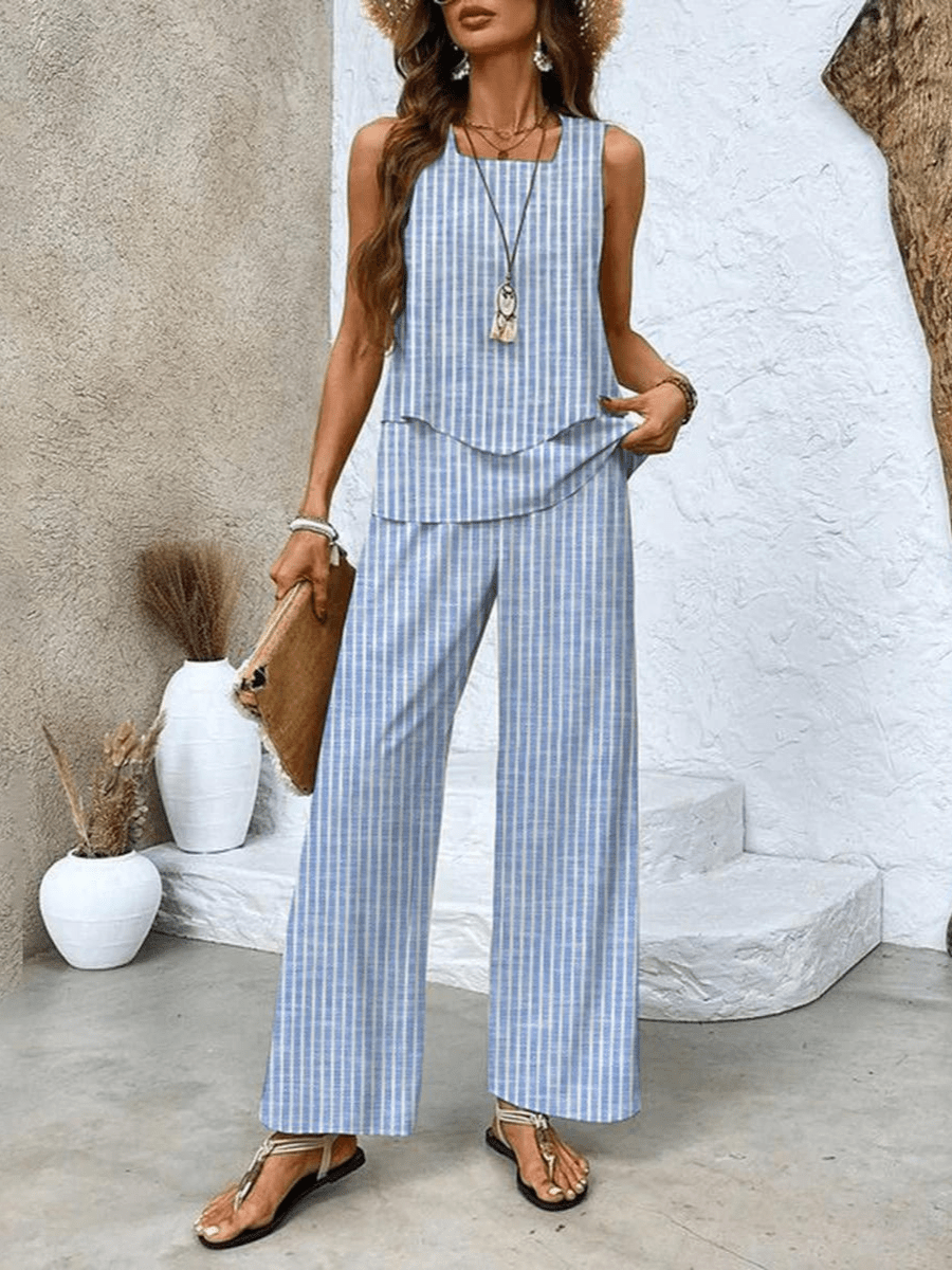 Casual chic women's two-piece summer set, featuring a light flowy top and elegant wide-leg pants.