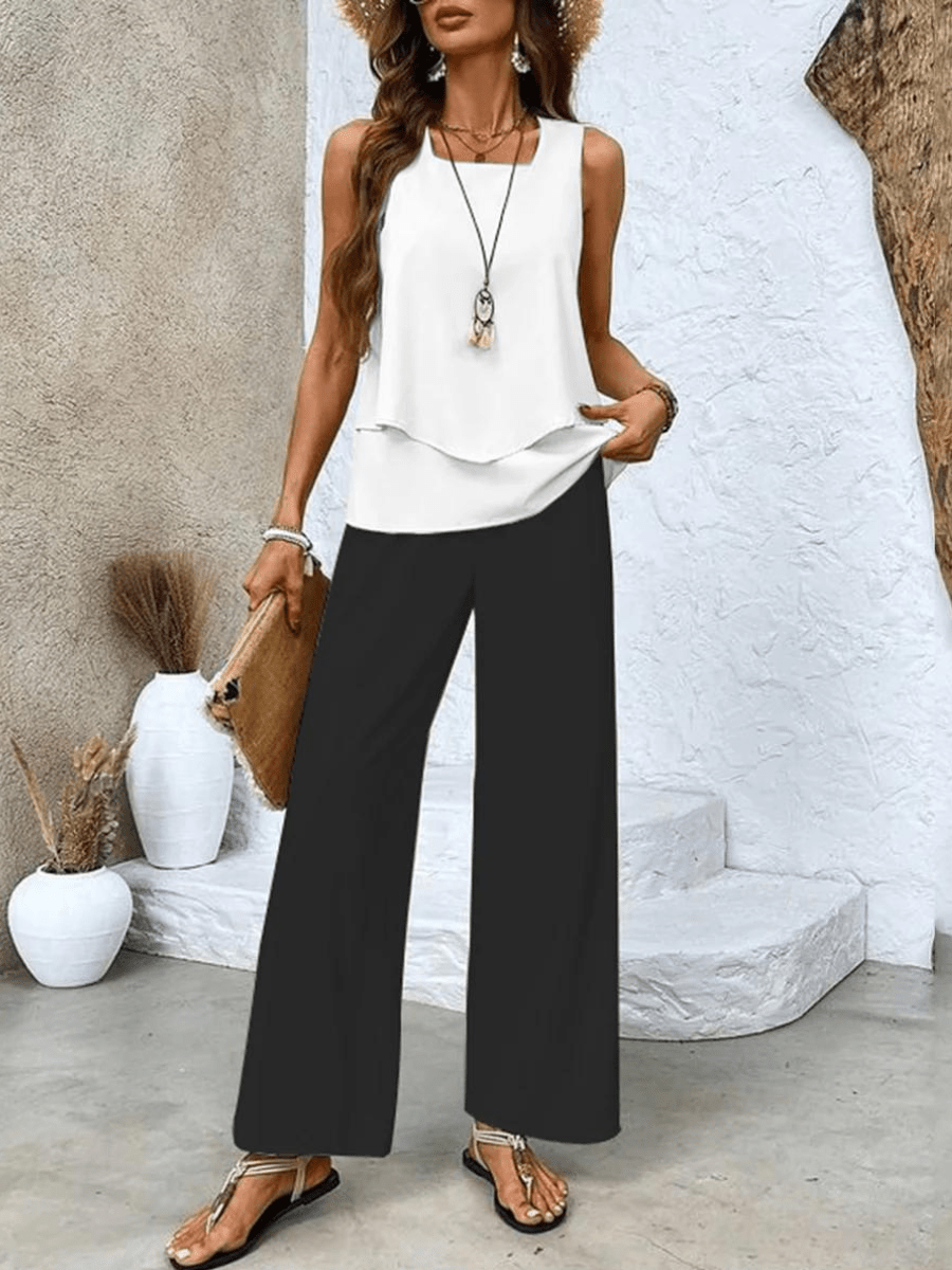 Coordinated women's summer outfit: flowy top and wide-leg pants set, perfect for a stylish warm-weather look.