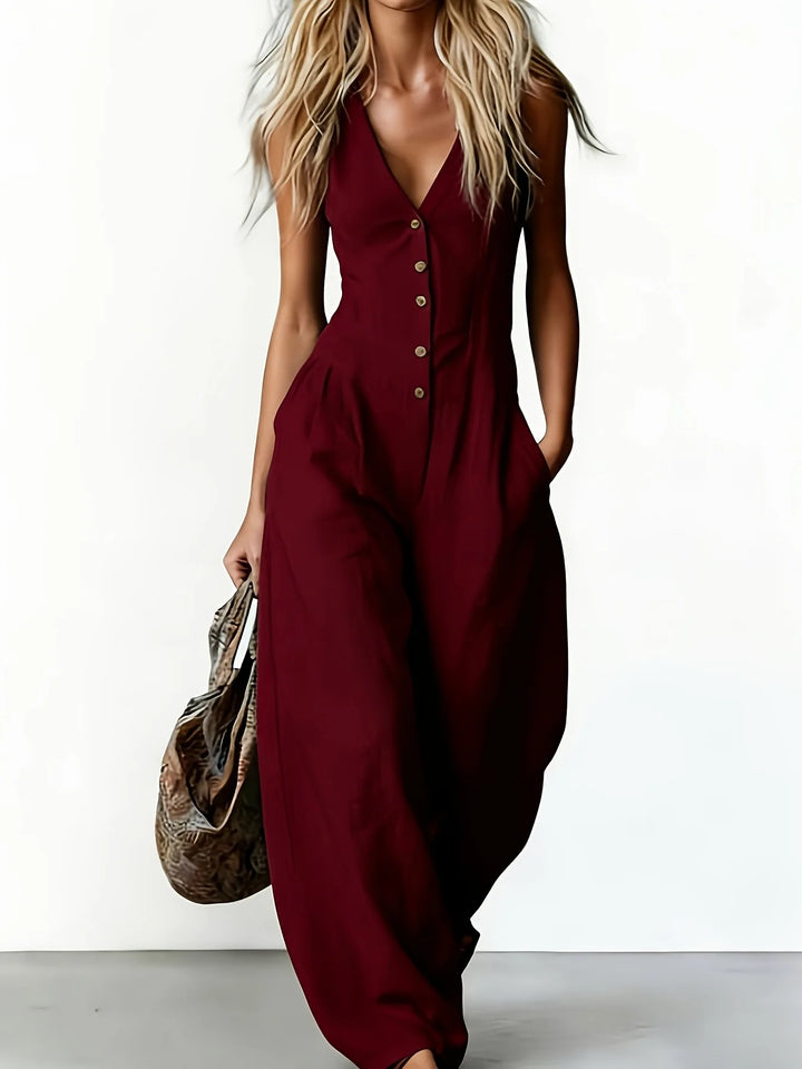 Sleeveless V-neck wide leg jumpsuit for women with pockets, ideal for effortless summer style.