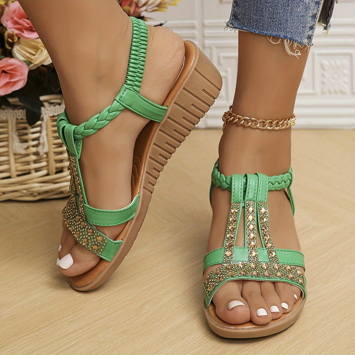 Sparkling rhinestone woven sandals for women, a chic and comfortable summer footwear choice.