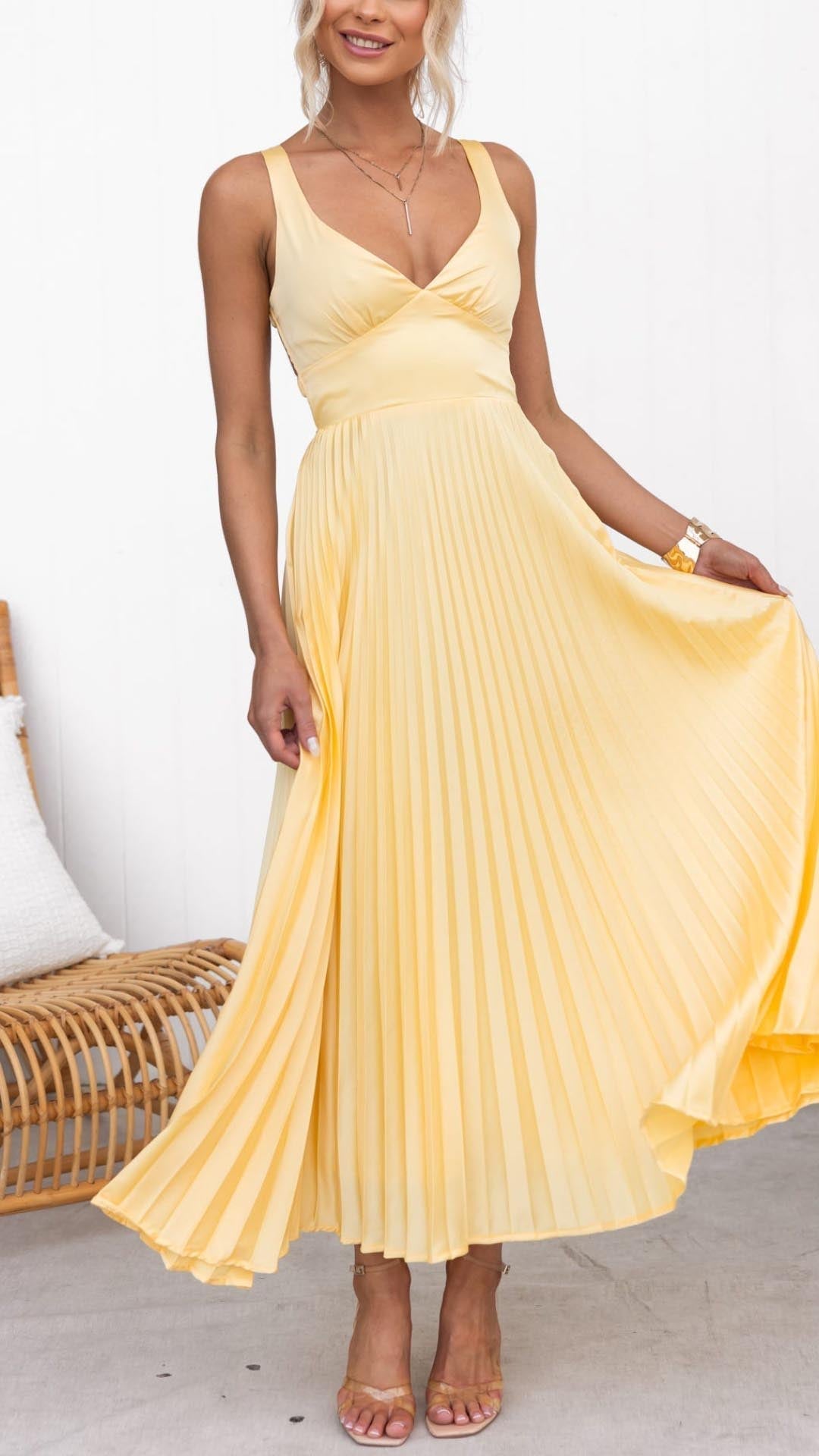 Chic yellow pleated V-neck midi dress for women, perfect for wedding guests, parties, or summer occasions.