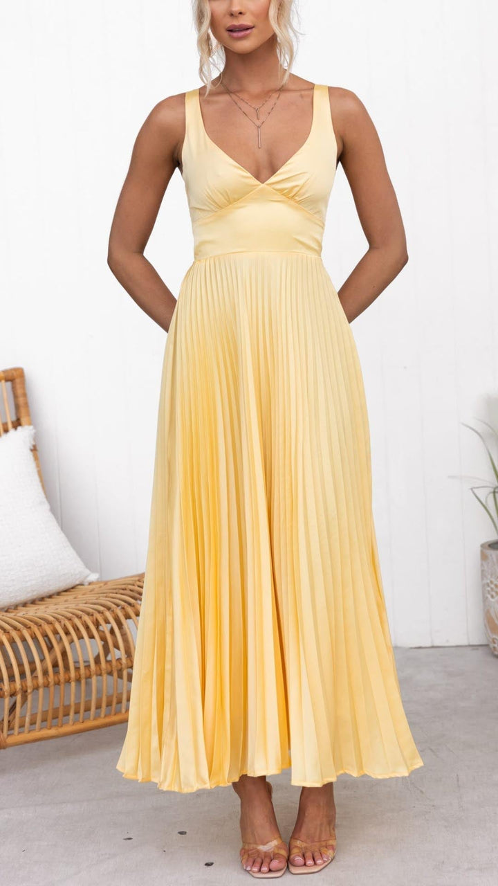 Elegant women's A-line V-neck midi wedding guest dress in yellow, featuring comfortable pleats & a flowy design.