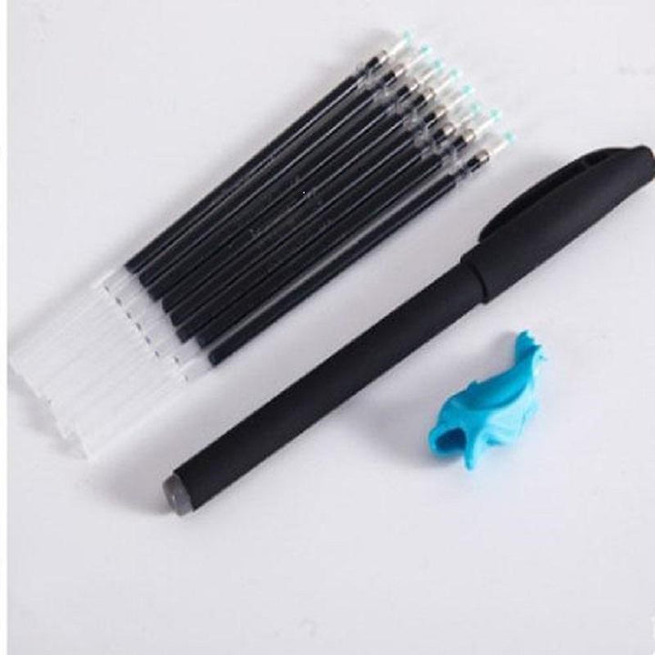 An open reusable magic copybook demonstrating how handwriting disappears, ready for more child practice.