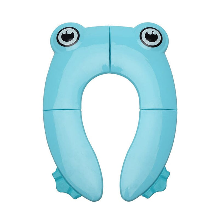 Parent helping a child sit on a children's folding portable potty seat on a home toilet, easy use