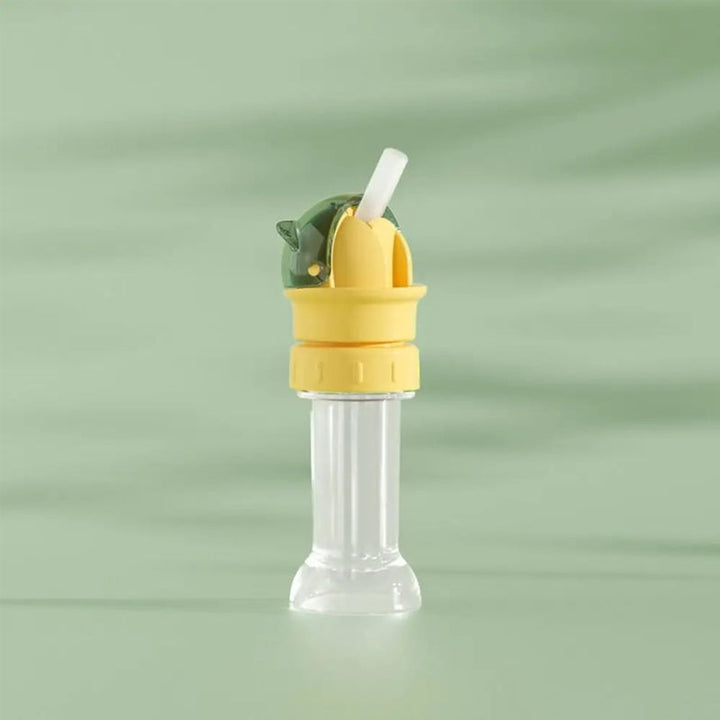 Detail shot of the silicone straw on a children's water bottle lid, for gentle hydration.