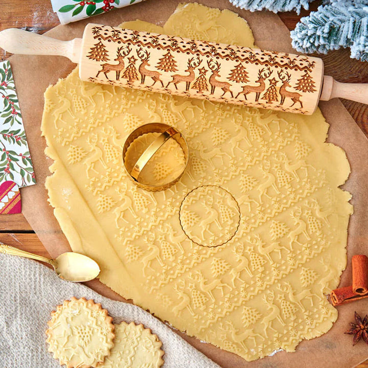 Holiday-themed wooden rolling pin, perfect for embossing dough with Christmas designs.