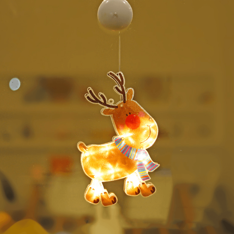 Close-up detail of the suction cup mechanism on a Christmas LED light, reliable window attachment