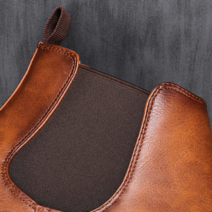 Tan suede men's Chelsea boots, durable and comfortable ankle boots, ideal for stylish outfits.