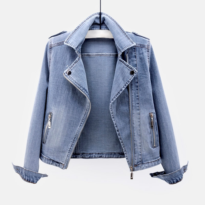 Classic blue women's denim jacket, button-up style. Versatile outerwear, a timeless fashion staple for any season.