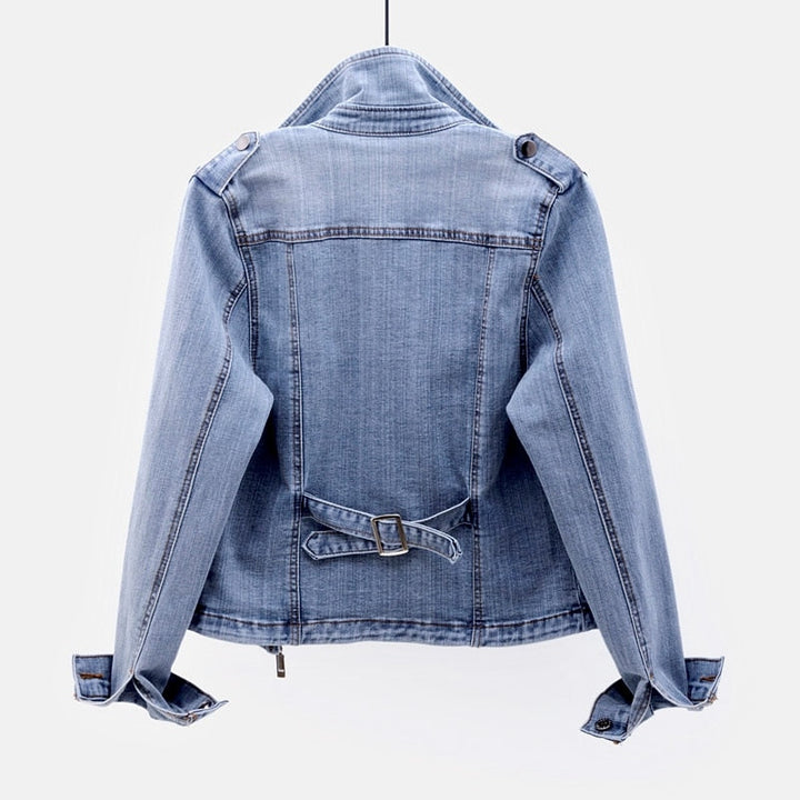 Stylish women's blue denim jacket with classic buttons. Casual everyday outerwear, a versatile fashion staple.