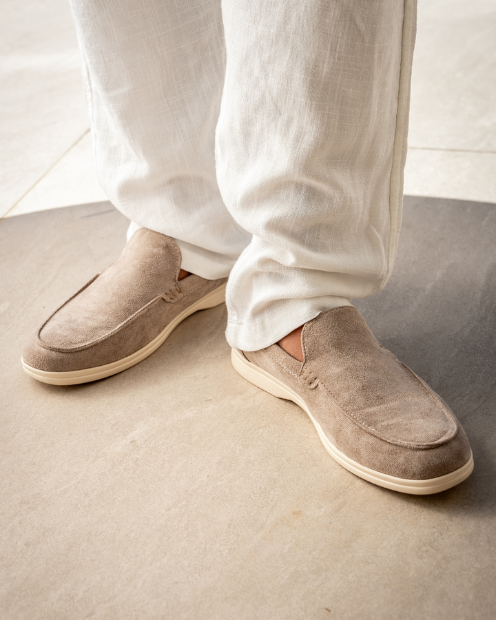 Sophisticated men's classic slip-on loafers. Enhanced comfort insole for versatile footwear styling.