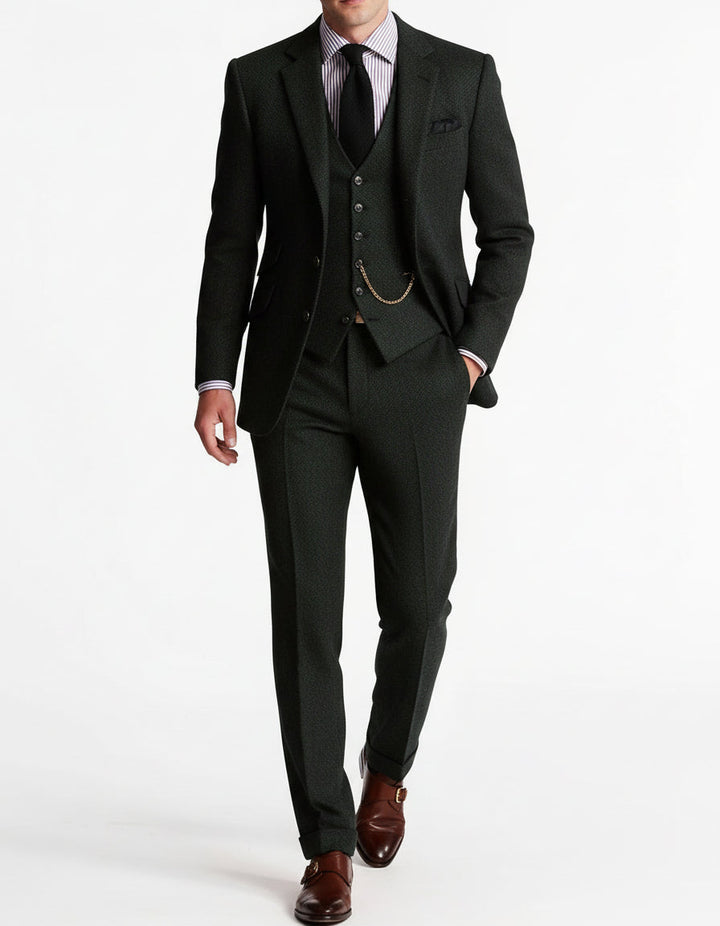 Elegant men's tailored three-piece suit perfect for weddings & special occasions. Classic formal wear in sophisticated black.