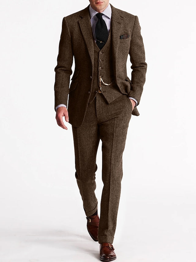 Tailored men's three-piece suit set for formal events: classic jacket, vest & trousers. High-quality elegant formal wear.
