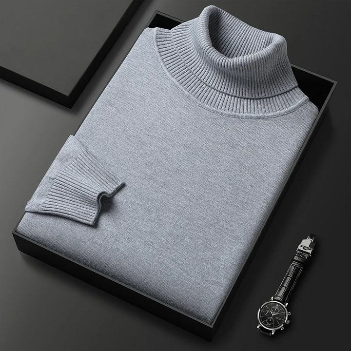 Men's gray classic fit turtleneck sweater, a timeless wardrobe essential.