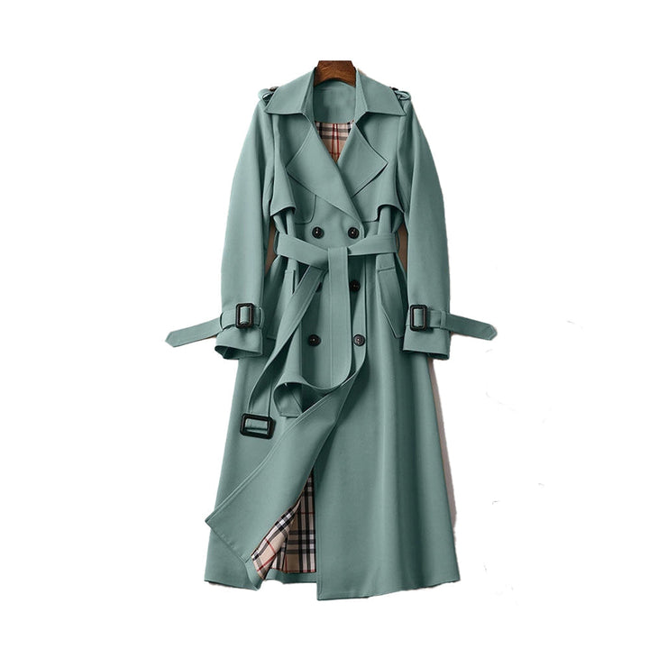 Elegant women's classic trench coat, ideal versatile outerwear for any season. Double-breasted fashion.