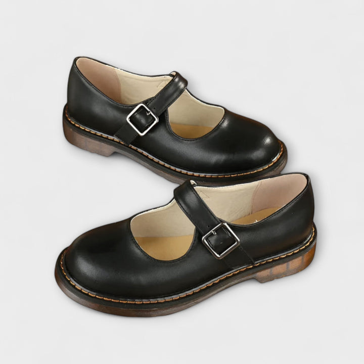 Elegant Women's Mary Jane sandals with a chic rounded toe and adjustable buckle strap, versatile for any outfit.
