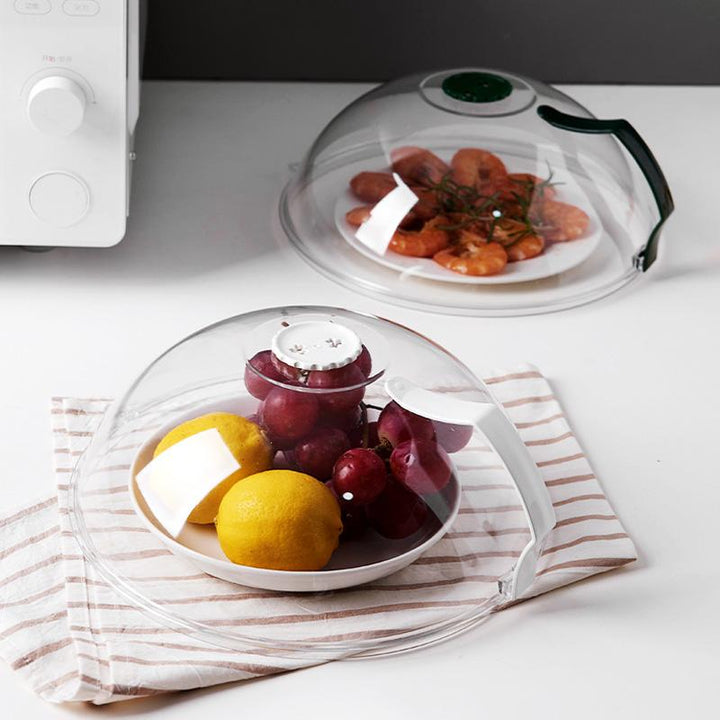 Ventilated microwave food splatter guard, heat-resistant, designed for safe and efficient food reheating in any kitchen.