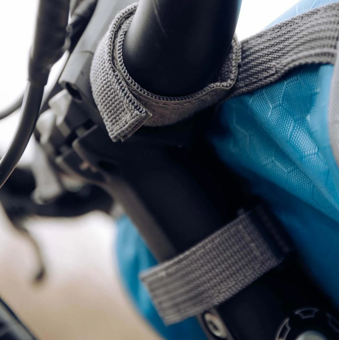 Unisex bike bag, easy-attach design, ample storage for phone, keys & cycling gear.