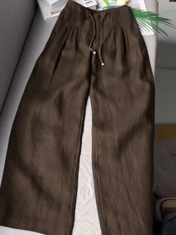 Fashionable women's elastic waist wide-leg trousers, ideal for chic comfort & a relaxed silhouette.