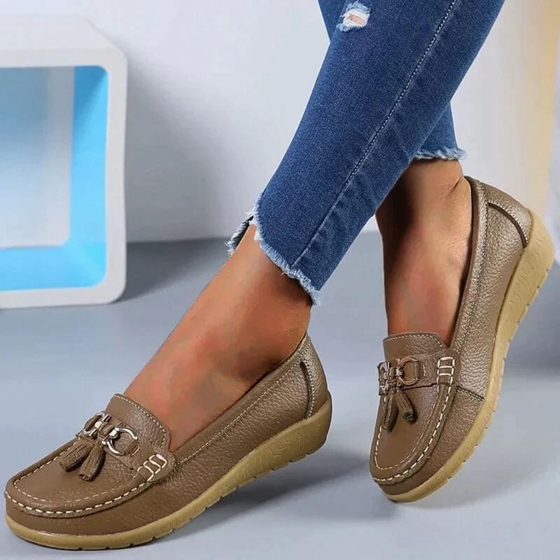 Close-up of Women's Orthopedic Comfort Loafers in black, highlighting slip-on design & arch support.