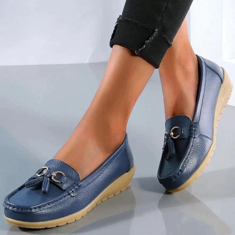 Side view of black women's walking loafers, featuring orthopedic design for all-day comfort.