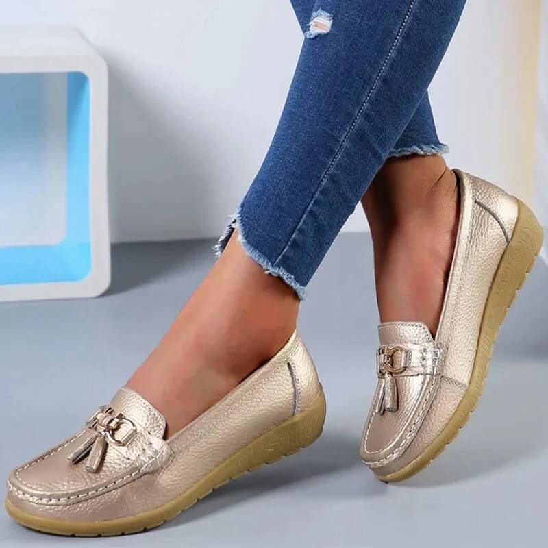 Women's comfort loafers in a neutral color, showcasing elegant casual style and foot support.
