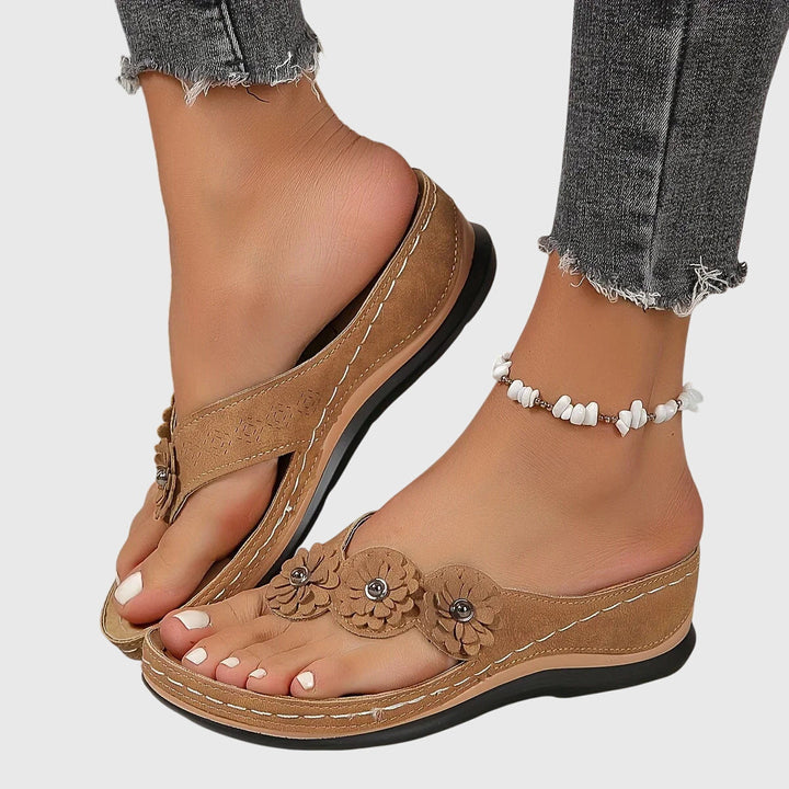Women's comfortable orthopedic flip flops, featuring shock-absorbing sole & ergonomic arch support.