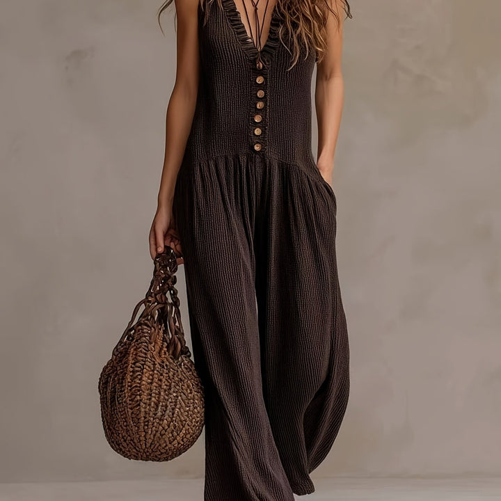 Stylish coffee brown women's jumpsuit: ruffle V-neck, smocked elastic waist, wide leg, and button front details.