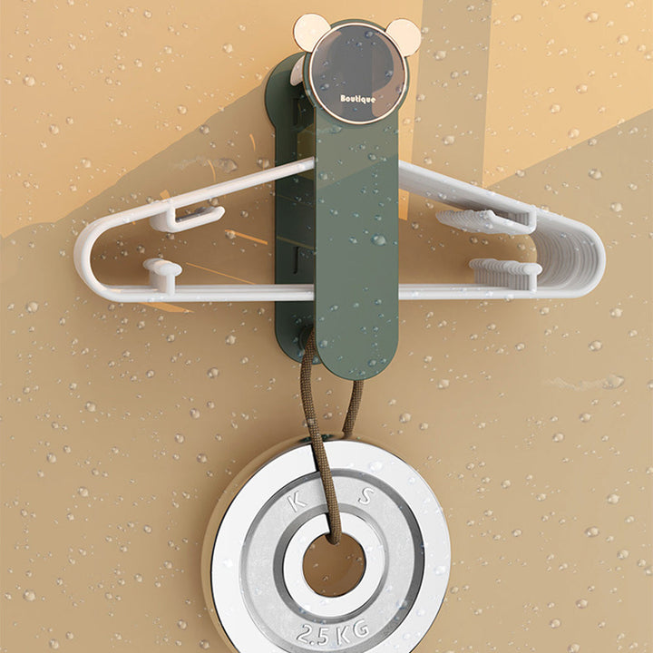 Retractable clothes hanger holder, ideal for laundry room organization and maximizing closet space.