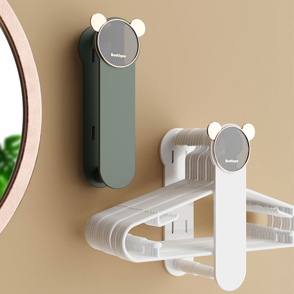 Space-saving wall hanger storage, helps maintain an organized closet and prevents hanger clutter.