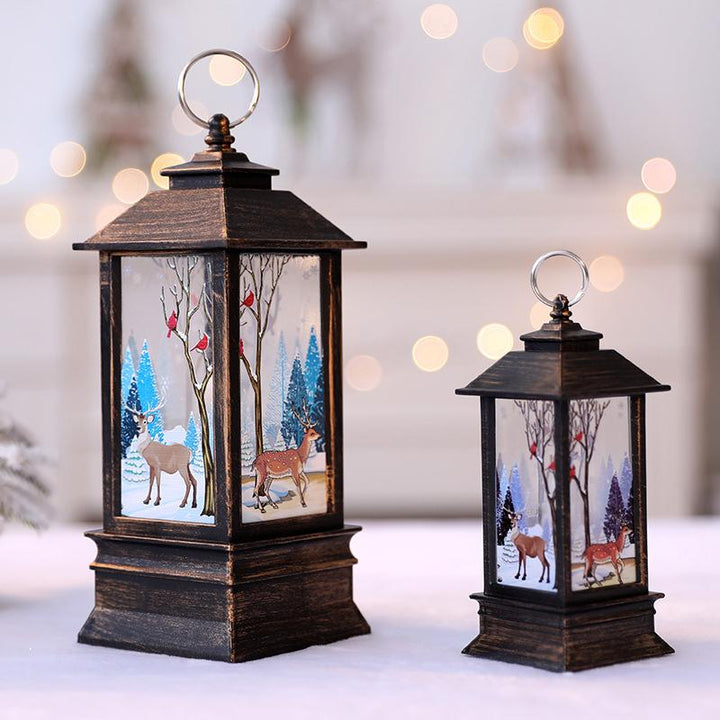 Elegant elk LED glitter candle, creating a warm glow for the Christmas season