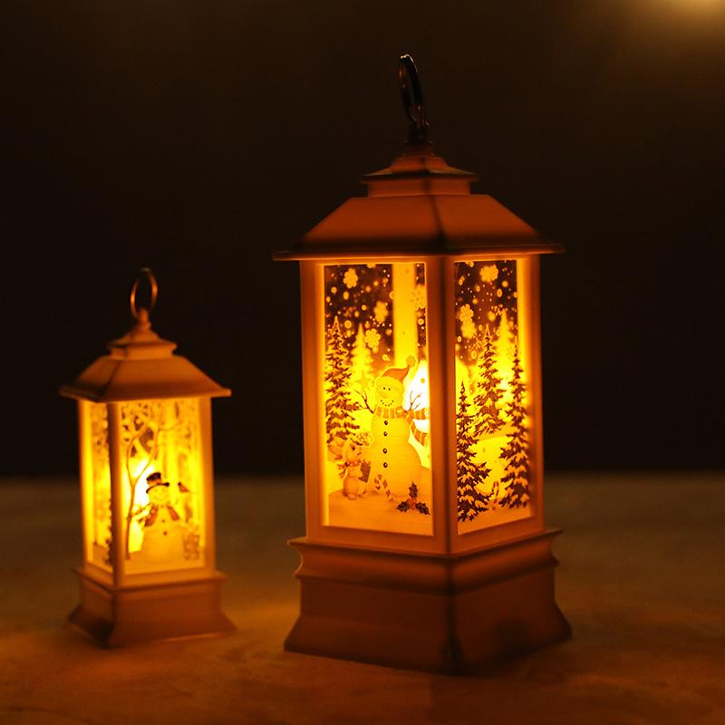 Christmas LED glitter candle illuminating a festive mantelpiece, holiday decor